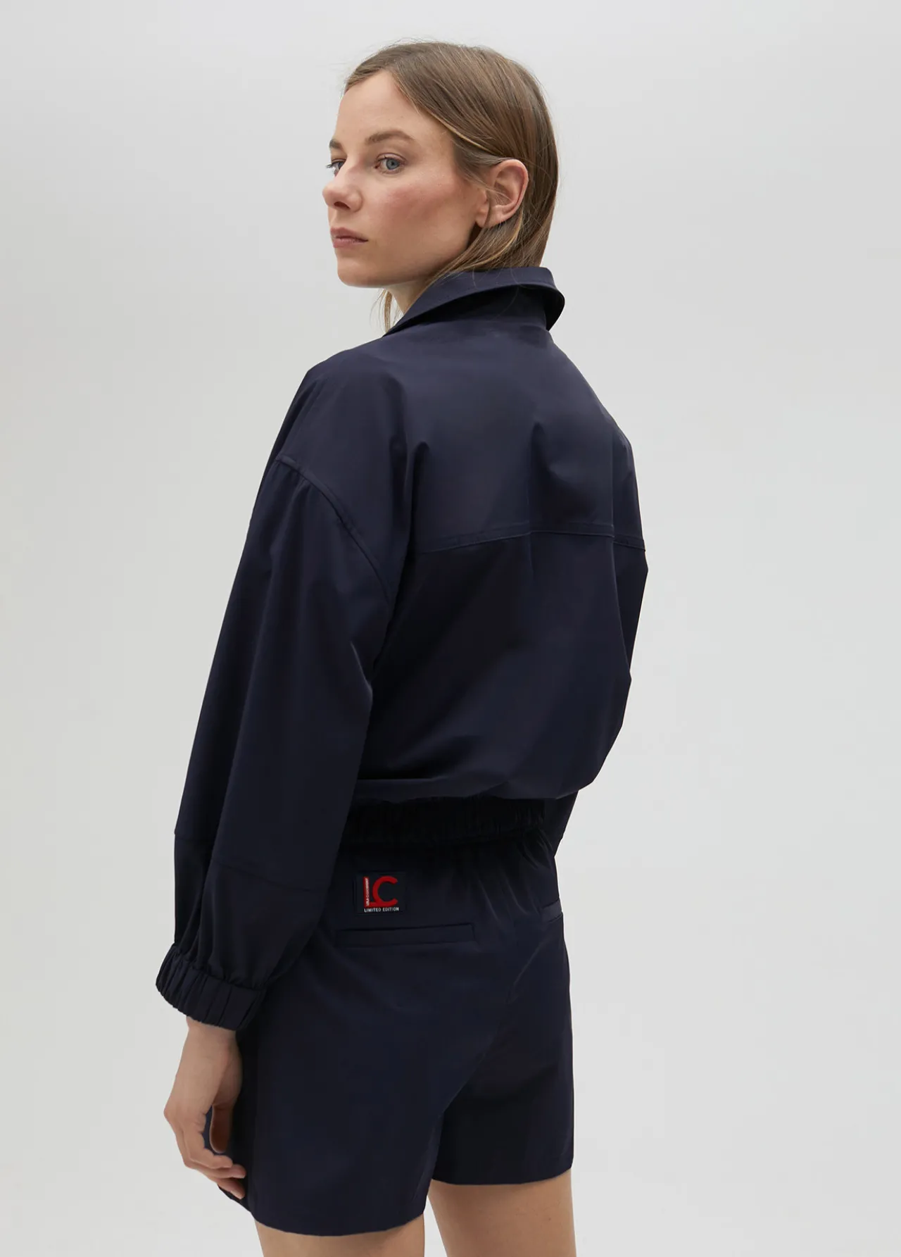 bomber_tcnica_de_edicin_limitada__lola_casademunt_7.webp Lola Casademunt Abrigos Y Cazadoras | Chaquetas Y Gabardinas<Bomber técnica de edición limitada - Lola Casademunt NAVY