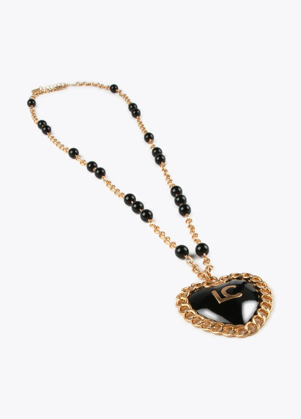 collar_medalla_corazn_1.webp Lola Casademunt Collares<Collar medalla corazón METAL-NEGRO
