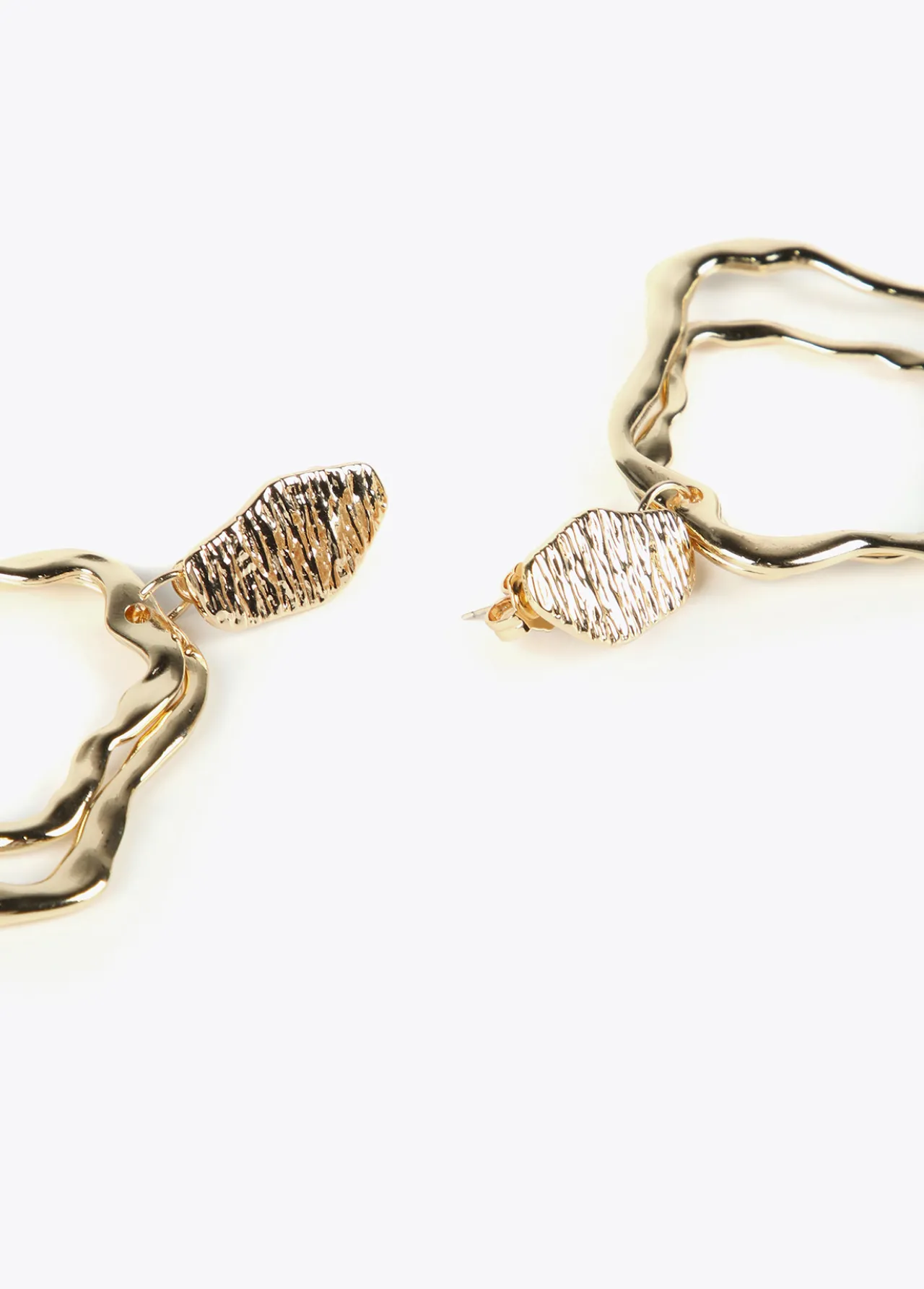 pendientes_dorados_multiforma_4.webp Lola Casademunt Bisuteria<Pendientes s multiforma DORADO