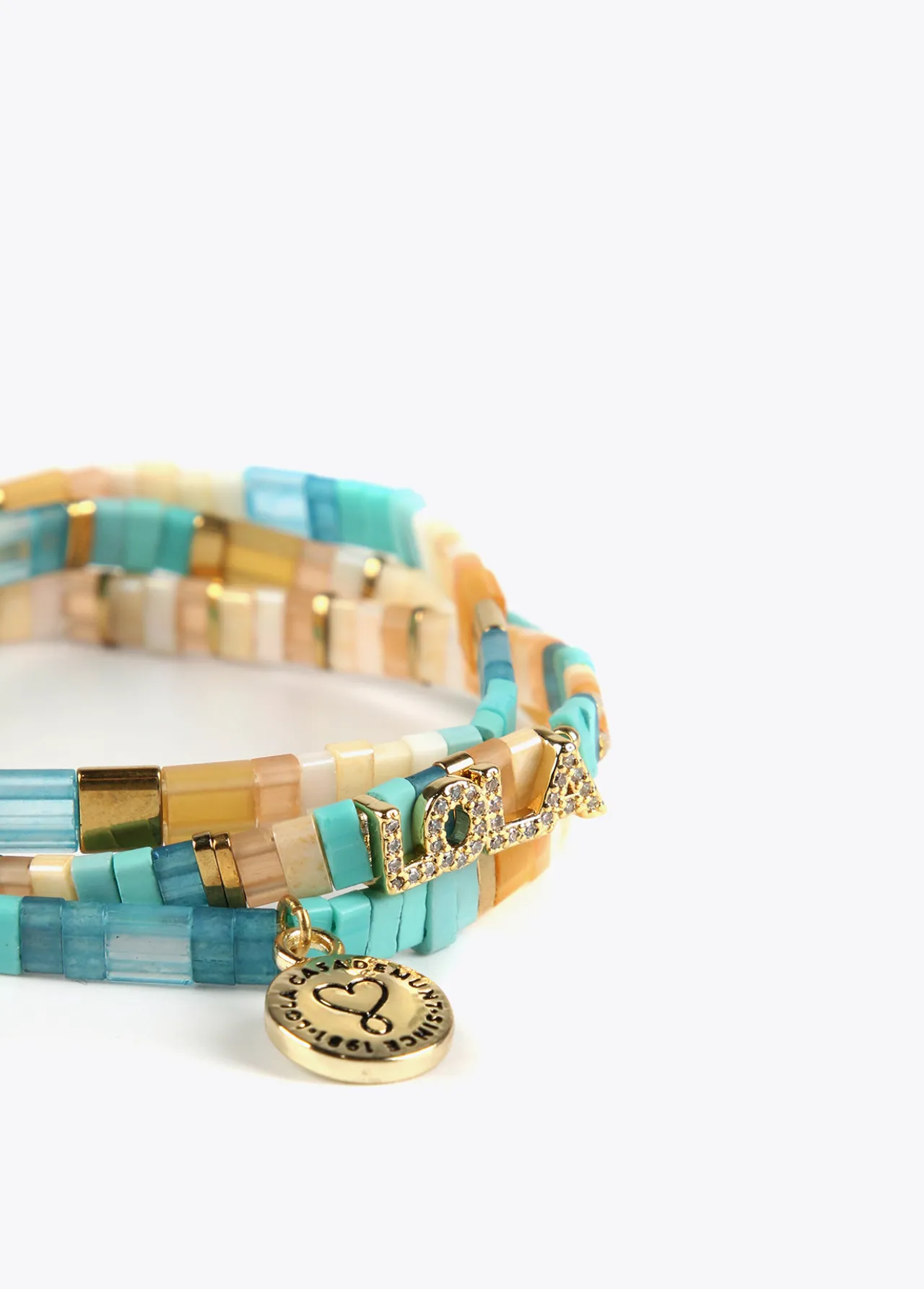 pulseras_elsticas_2-2.webp Lola Casademunt Bisuteria<Pulseras elásticas VERDE-AZUL