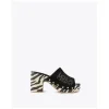 Lola Casademunt Calzado<Zueco suela zebra y logo dorado. NEGRO